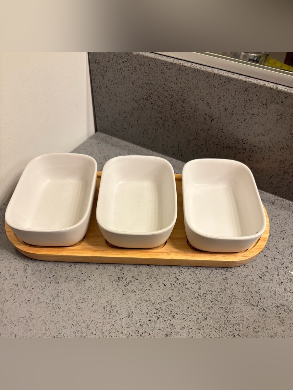 Crate & Barrel White Ceramic Triple Serving Dish on Bamboo Tray